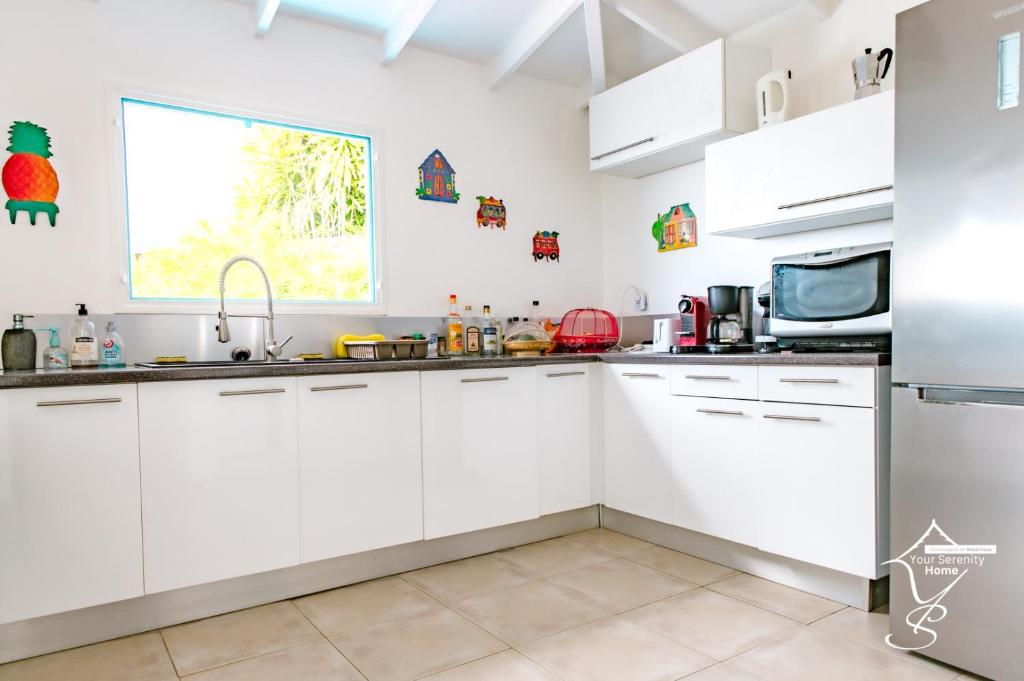 Kuchyň nebo kuchyňský kout v ubytování Villa Marissea