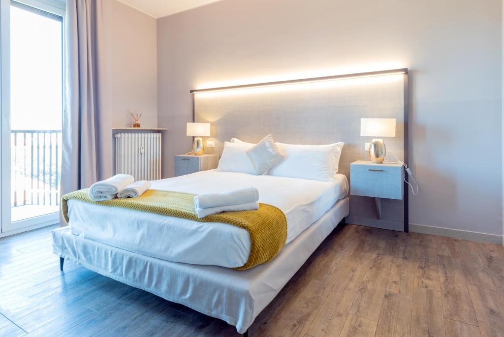 Кровать или кровати в номере Milan Retreats