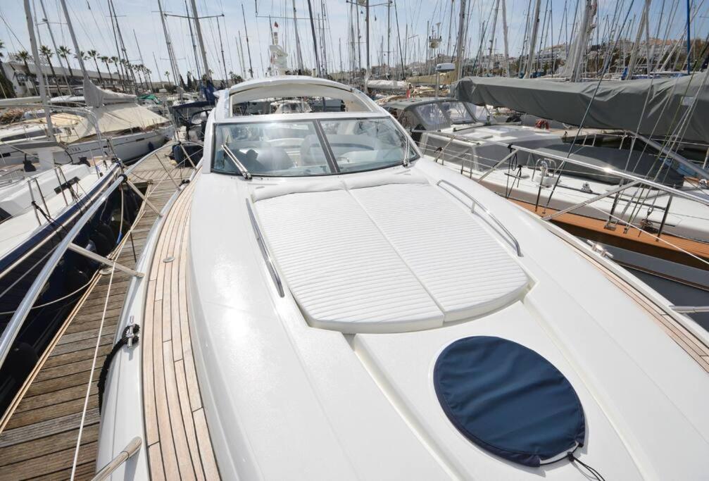 a boat is docked in a harbor with other boats at Special Yacht Rental in Gocek in Fethiye