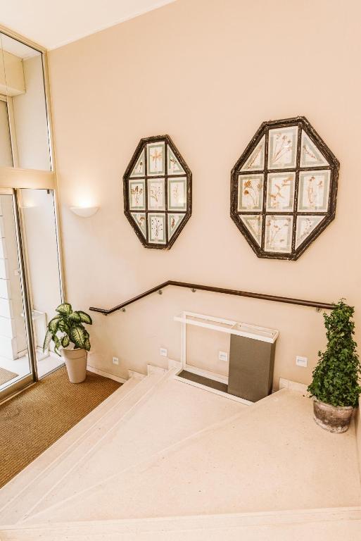 Postel nebo postele na pokoji v ubytování Palazzo Bezzi Hotel