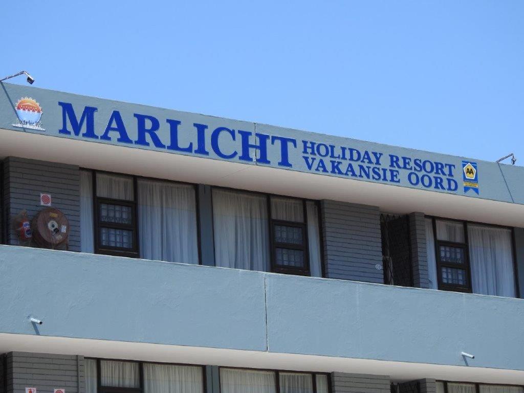 un edificio con un cartel encima en Marlicht Vacation Resort en Margate