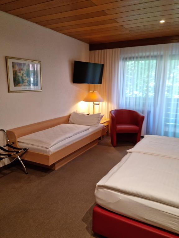 Postel nebo postele na pokoji v ubytování Hotel Rebstock