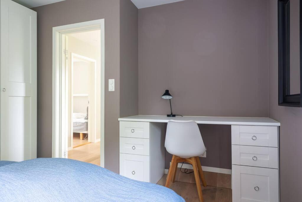 Postel nebo postele na pokoji v ubytování Cozy Apartment