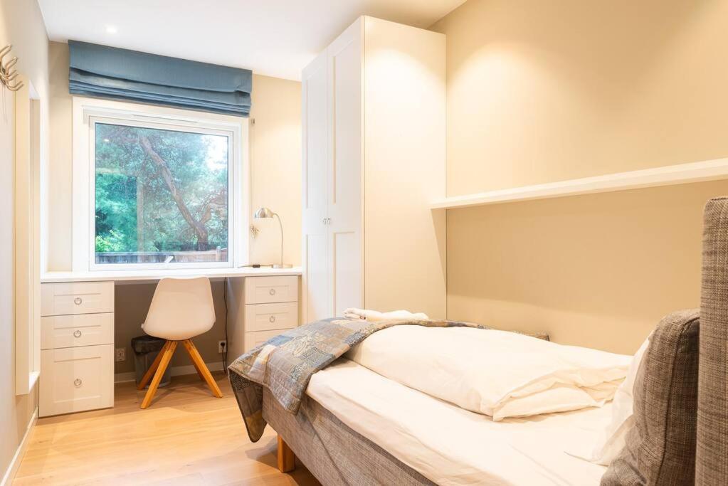 Postel nebo postele na pokoji v ubytování Cozy Apartment