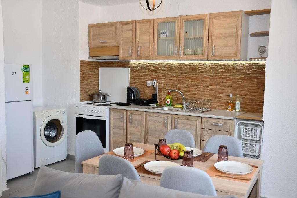 A kitchen or kitchenette at Elounda Sonata Luxury