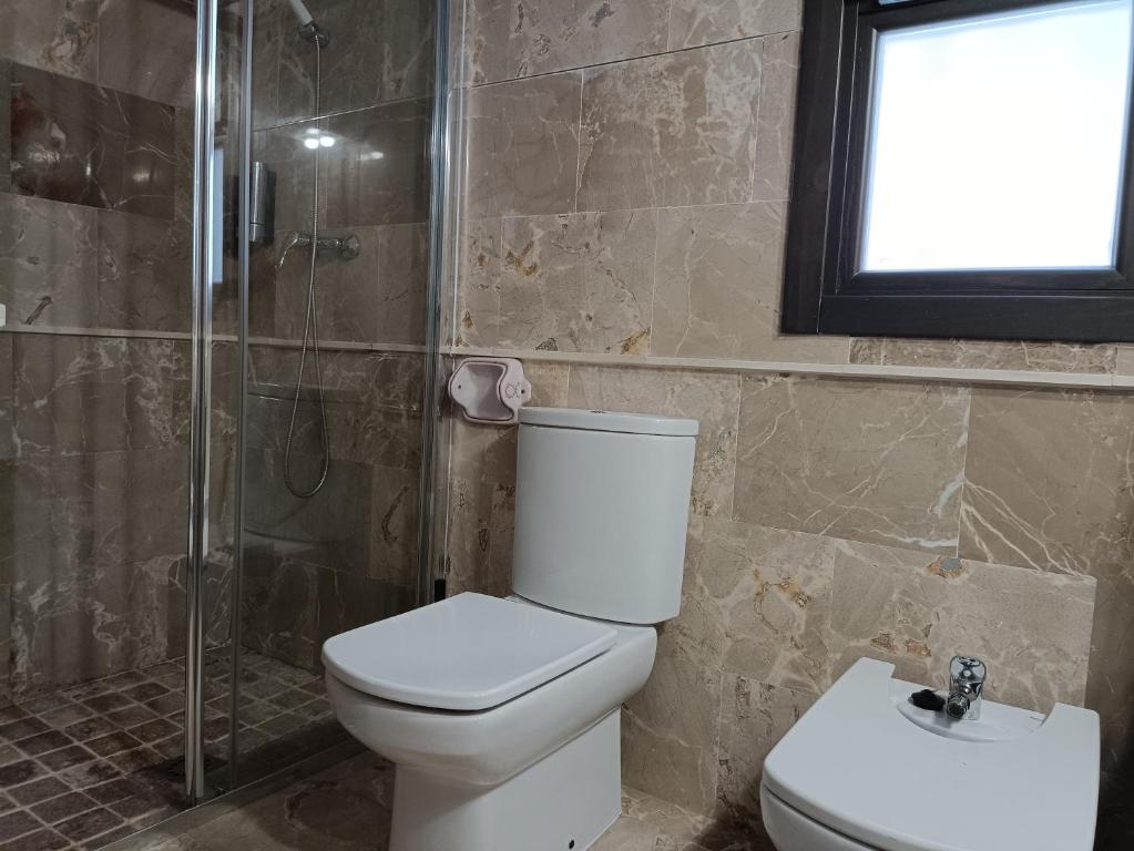 Kúpeľňa v ubytovaní Apartamentos Luxury Puente de Triana