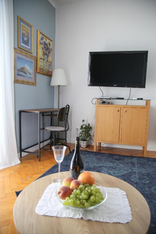 Televízia a/alebo spoločenská miestnosť v ubytovaní Lux Apartment Duje