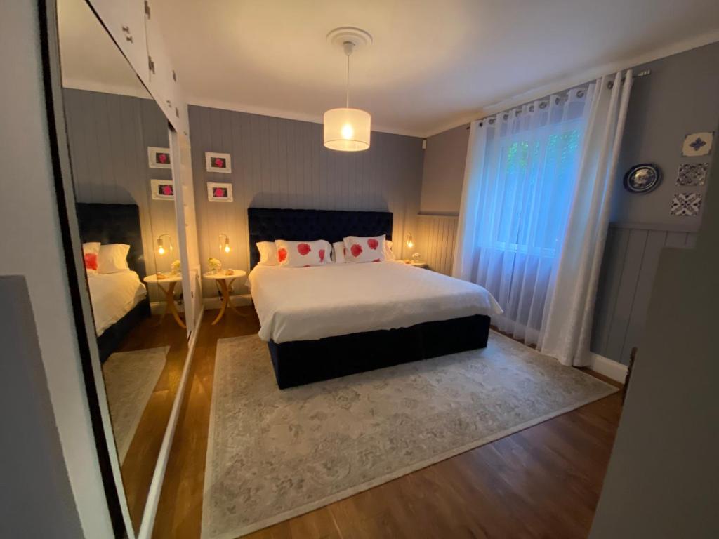Postel nebo postele na pokoji v ubytování Quinta dos Bravos