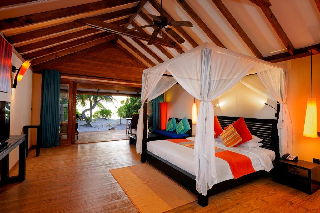 Postel nebo postele na pokoji v ubytování Canareef Resort Maldives