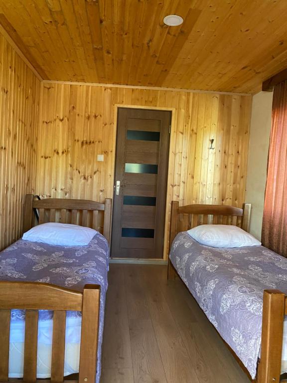 Postel nebo postele na pokoji v ubytování Guest House Gordila