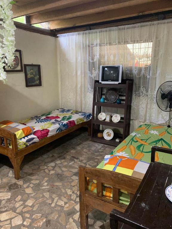 Postel nebo postele na pokoji v ubytování D Sanctum Resort