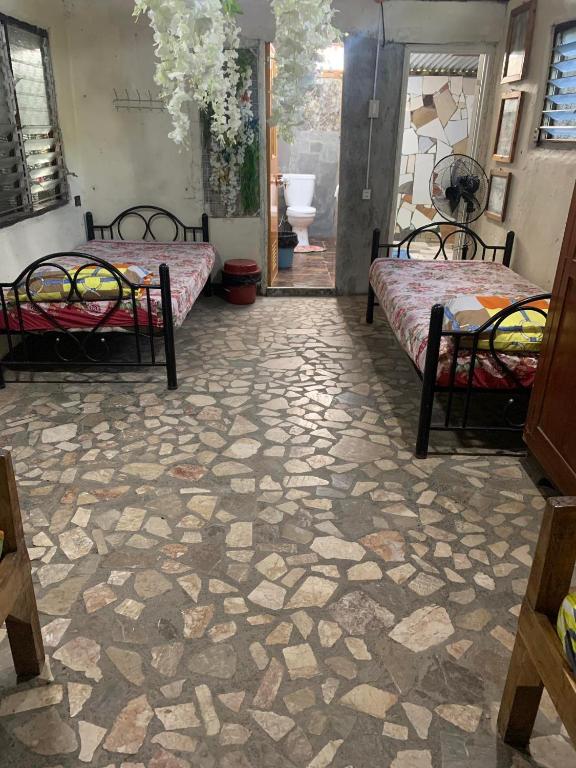 Postel nebo postele na pokoji v ubytování D Sanctum Resort