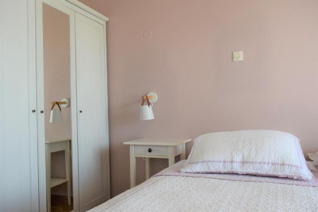 Postel nebo postele na pokoji v ubytování Simatos αpARTments & Studios