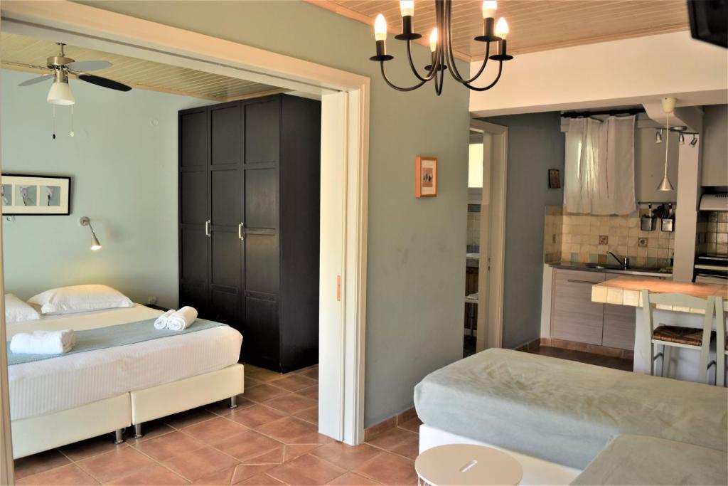 Postel nebo postele na pokoji v ubytování Simatos αpARTments & Studios