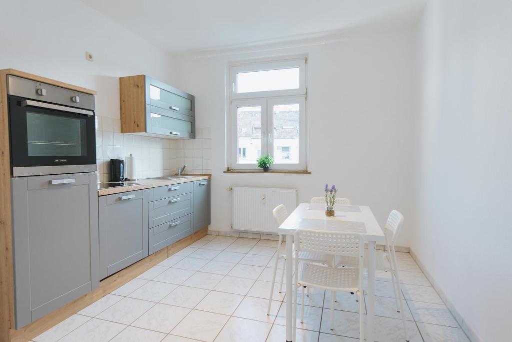 Kuchyň nebo kuchyňský kout v ubytování Apartment Central 85I 55 qm Wi-Fi free