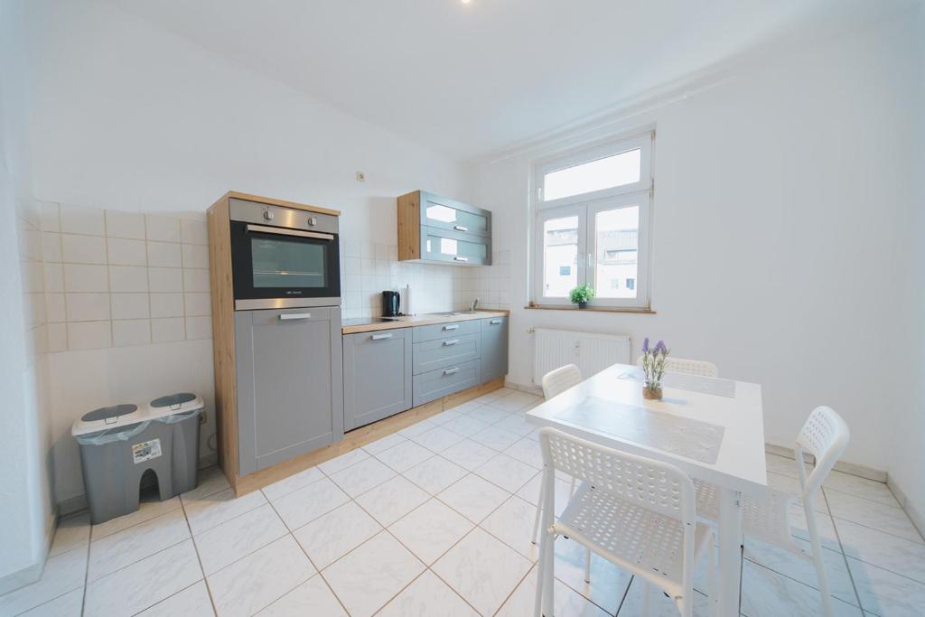 Kuchyň nebo kuchyňský kout v ubytování Apartment Central 85I 55 qm Wi-Fi free