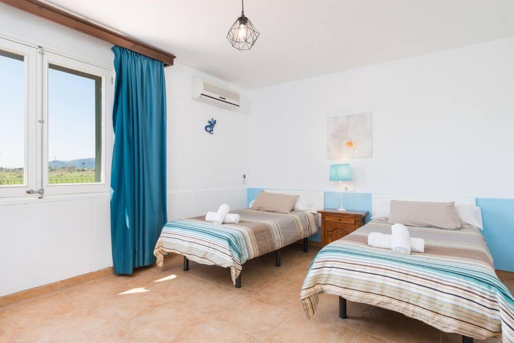 Postel nebo postele na pokoji v ubytování Villa Volentina