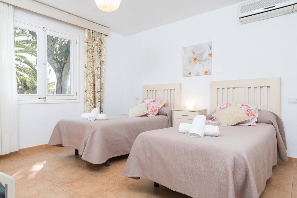 Postel nebo postele na pokoji v ubytování Villa Volentina