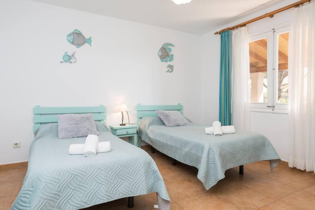 Postel nebo postele na pokoji v ubytování Villa Volentina