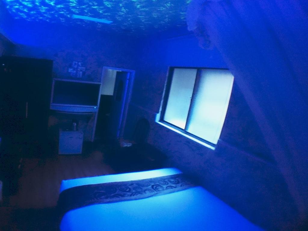Postel nebo postele na pokoji v ubytování Fu Chia Hotel