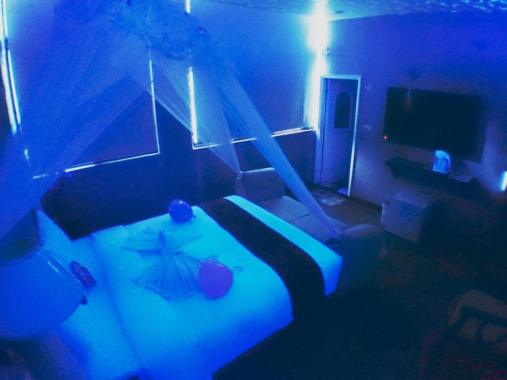 Postel nebo postele na pokoji v ubytování Fu Chia Hotel