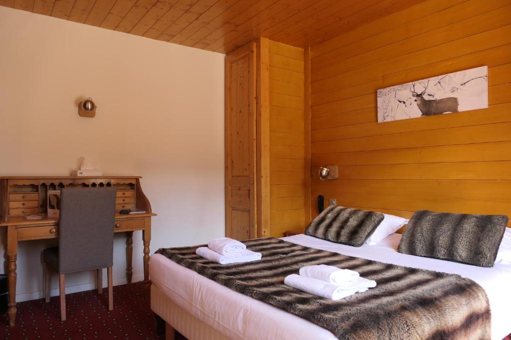 Postel nebo postele na pokoji v ubytování Hotel Christiania