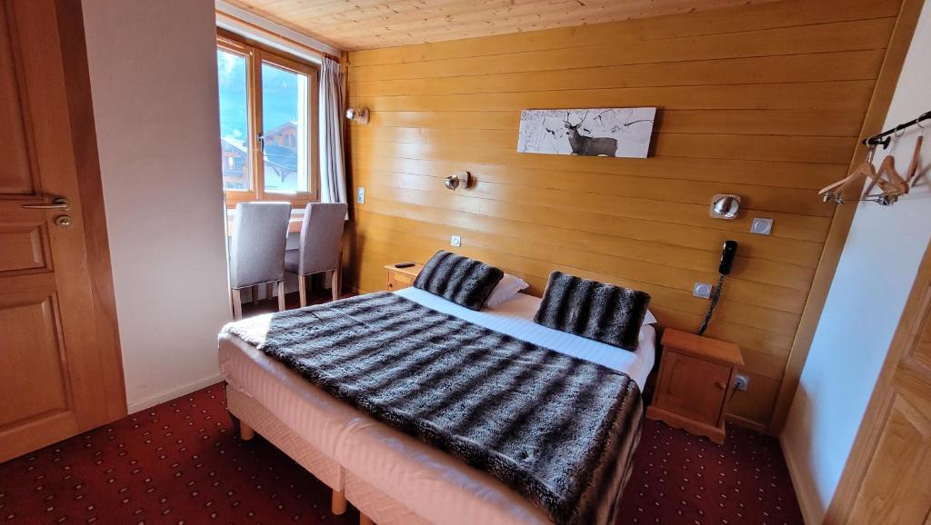 Postel nebo postele na pokoji v ubytování Hotel Christiania