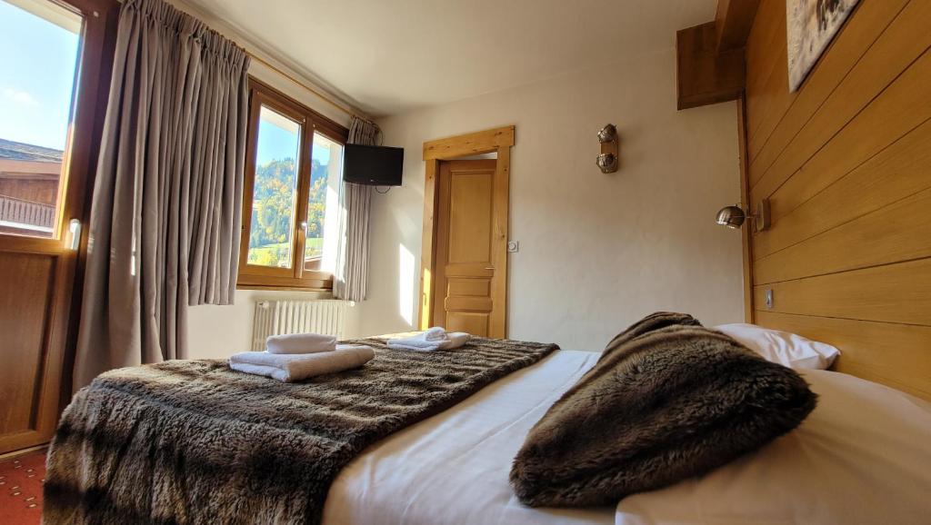 Postel nebo postele na pokoji v ubytování Hotel Christiania