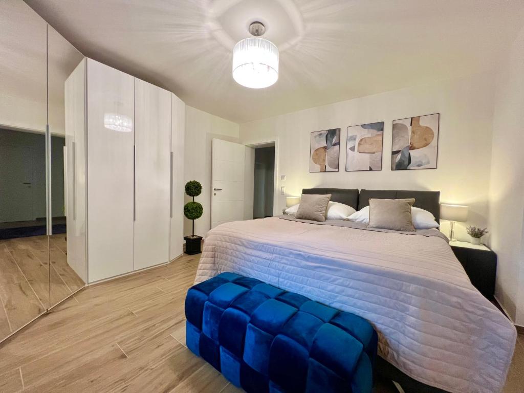 Postel nebo postele na pokoji v ubytování SEE-Residenz ST. ANNA - mit exklusivem Seezugang