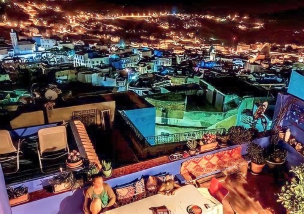 a view of a city at night at DAR DAUIA in Chefchaouen