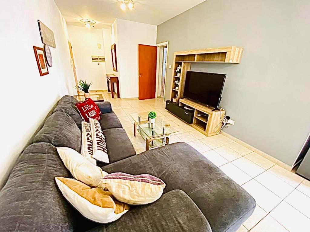 TV a/nebo společenská místnost v ubytování Mackenzie apartment 301