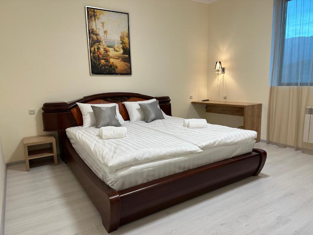 Postel nebo postele na pokoji v ubytování Hotel X