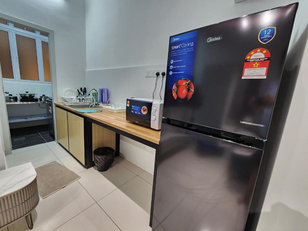 Kuchyň nebo kuchyňský kout v ubytování Horizon Premium Suite - Ipoh