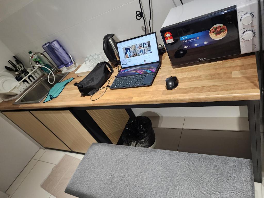 Kuchyň nebo kuchyňský kout v ubytování Horizon Premium Suite - Ipoh
