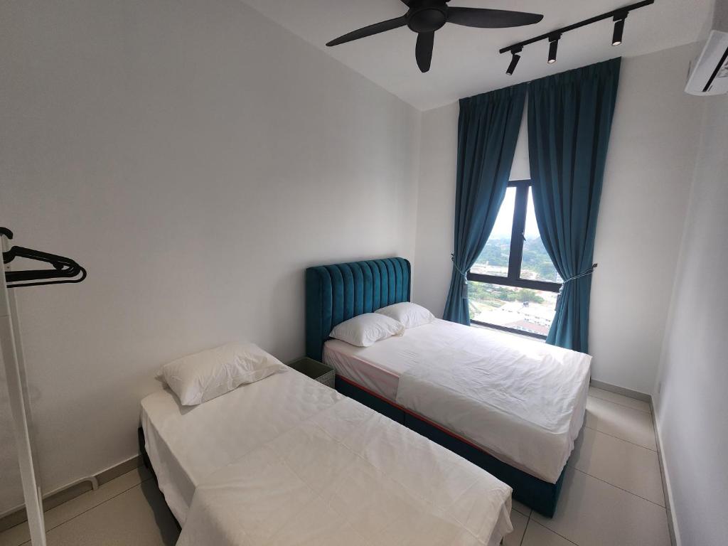 Postel nebo postele na pokoji v ubytování Horizon Premium Suite - Ipoh