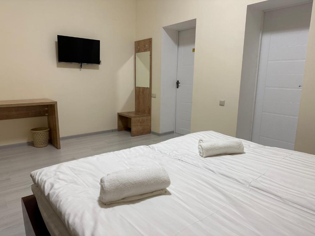 Postel nebo postele na pokoji v ubytování Hotel X