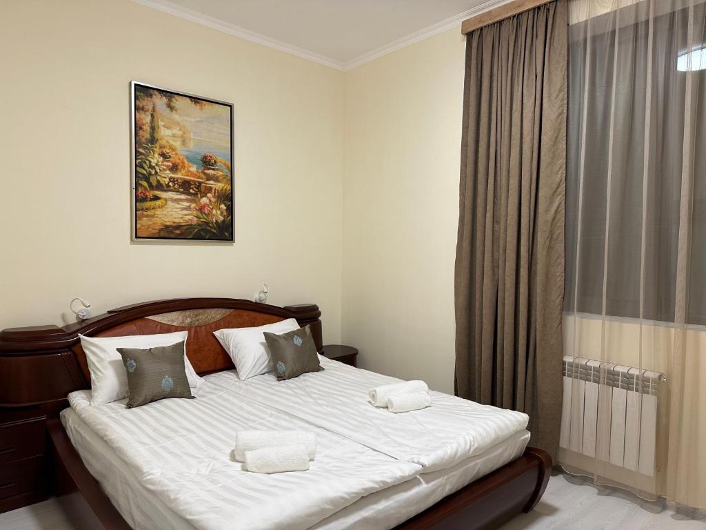 Postel nebo postele na pokoji v ubytování Hotel X
