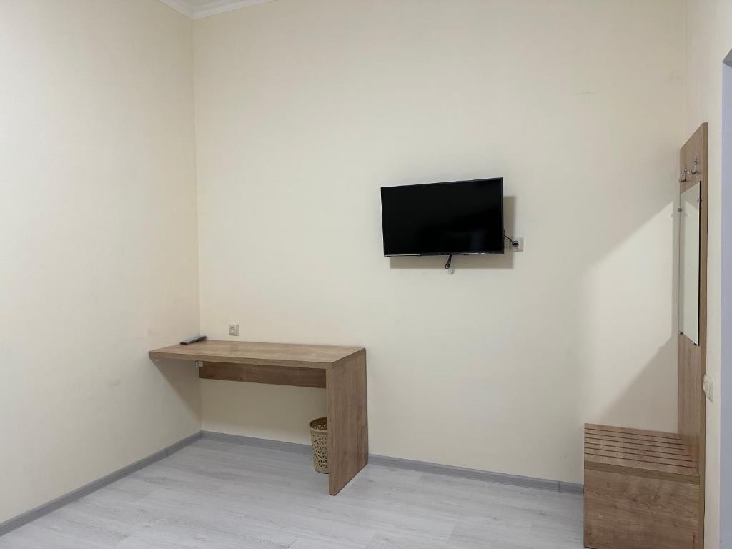 TV a/nebo společenská místnost v ubytování Hotel X