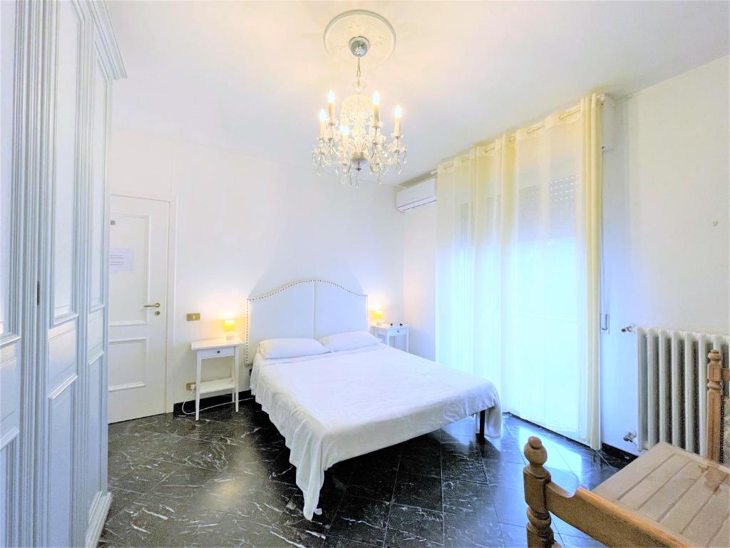 Postel nebo postele na pokoji v ubytování Airport Suites - 2