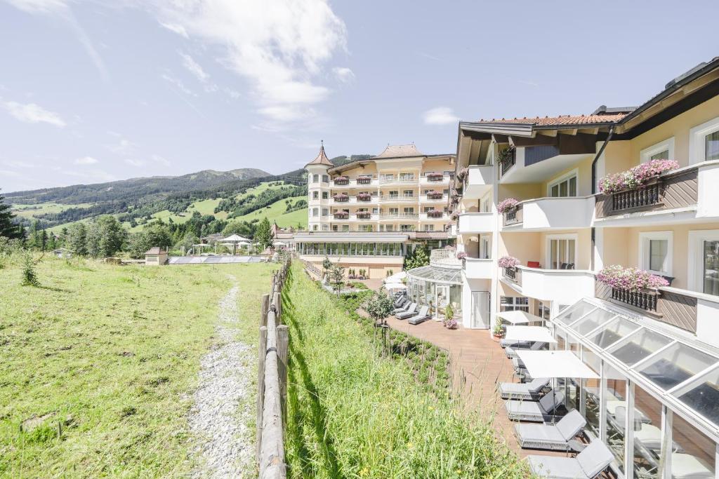 a view of the hotel from the balcony of the hotel at Traumhotel Alpina Superior Adults Only Hotel in Gerlos