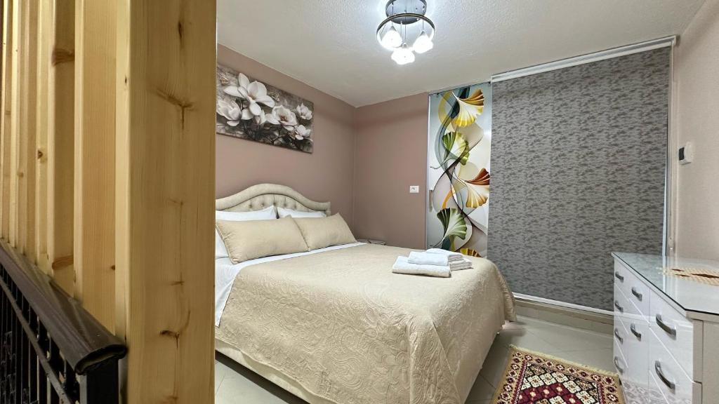 Postel nebo postele na pokoji v ubytování Duplex Mino, Pazari i Vjetër Korçë