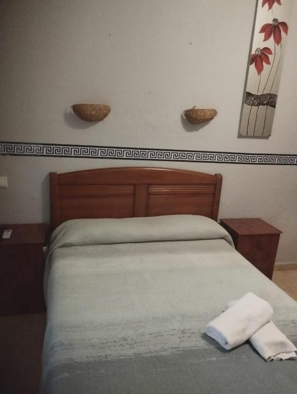 Posteľ alebo postele v izbe v ubytovaní Hospedería Lucano