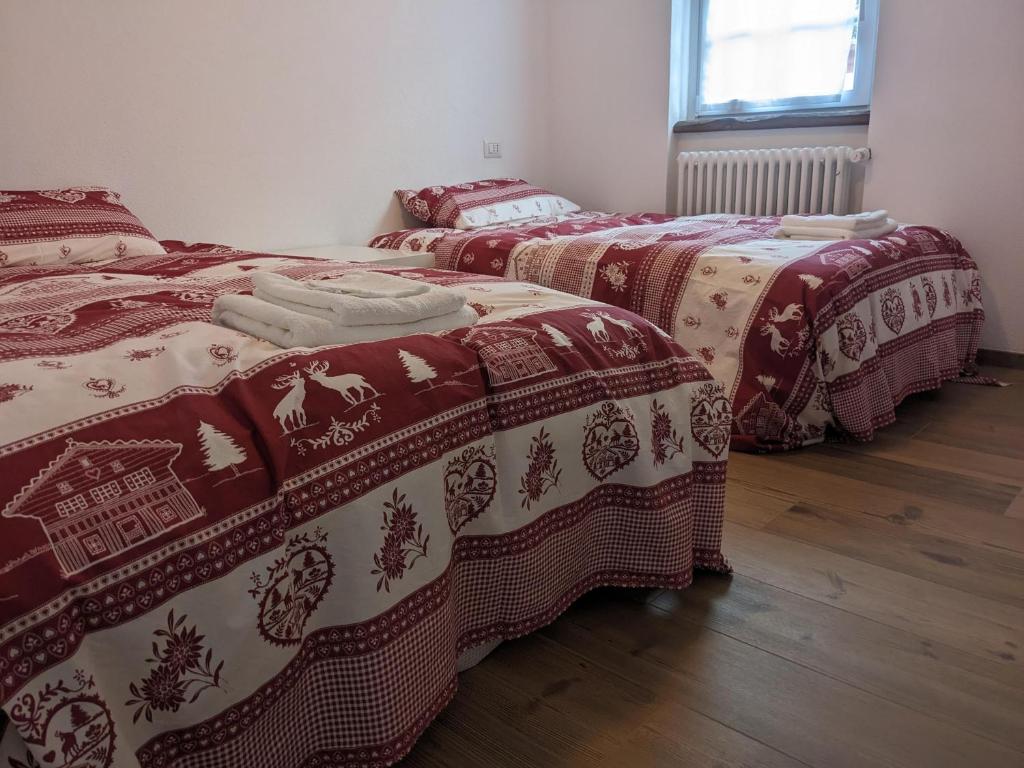 Postel nebo postele na pokoji v ubytování Casa della Frua - Frudarhus