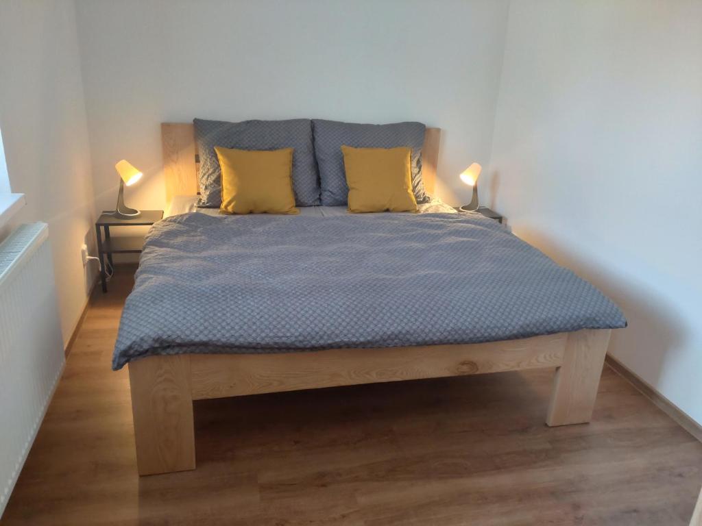 Postel nebo postele na pokoji v ubytování Apartmán Karlovice - Jeseníky
