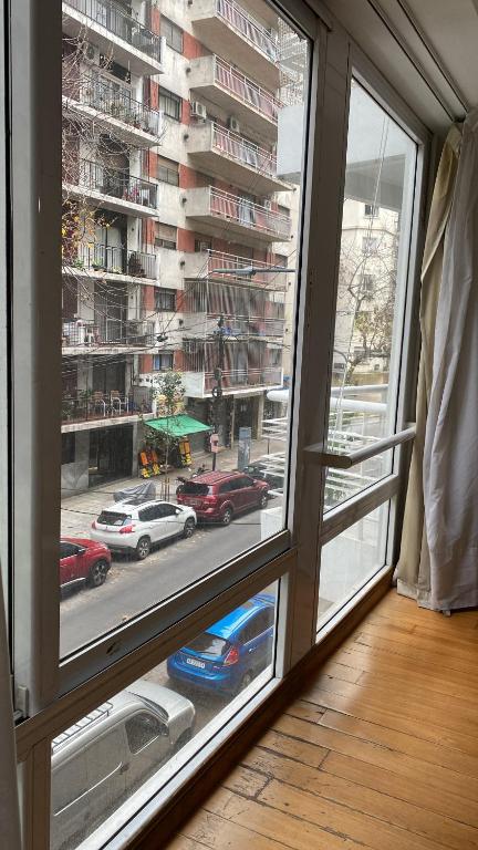 a window with a view of a city street at Monoambiente en Cañitas in Buenos Aires
