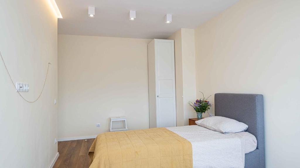 Postel nebo postele na pokoji v ubytování Central DELUXE Apartment