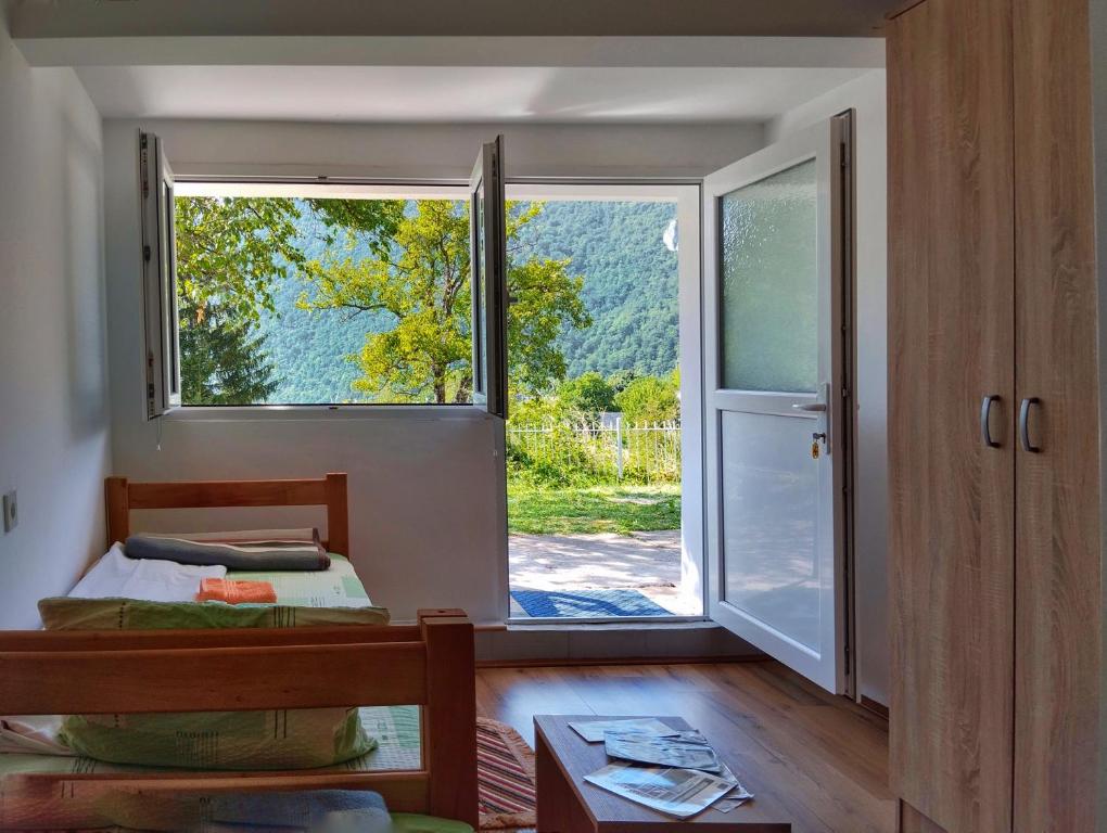 Postel nebo postele na pokoji v ubytování Guesthouse Mirkovic