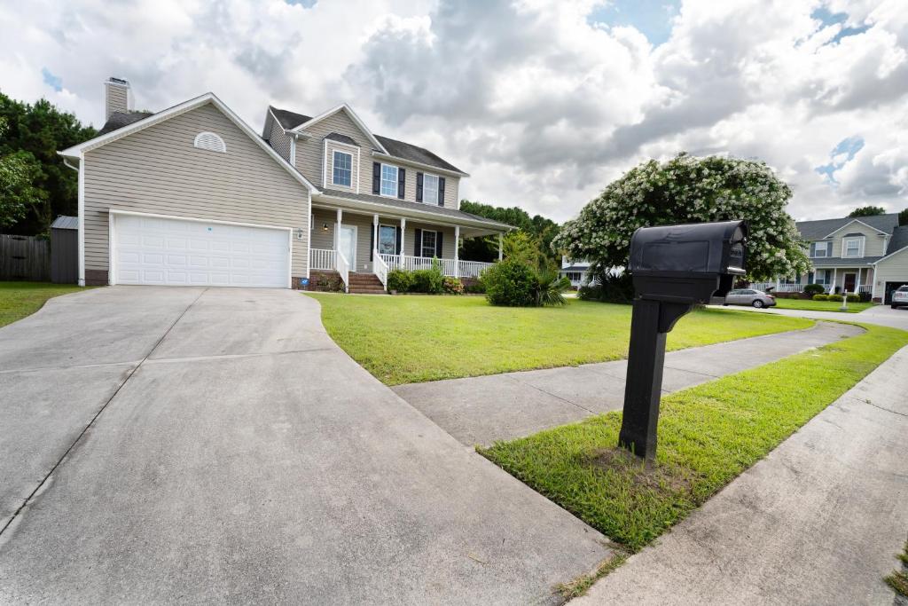 a parking meter in front of a house at Beautiful home near Marine Corps base in Jacksonville