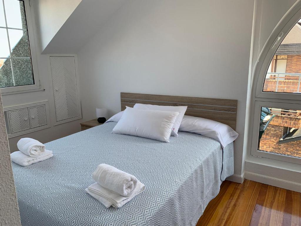 Postel nebo postele na pokoji v ubytování Apartamento Somo SARR