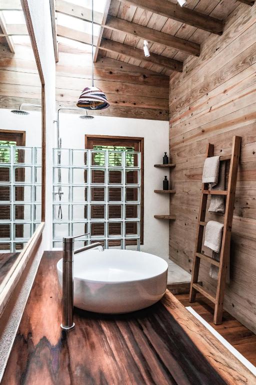 Postel nebo postele na pokoji v ubytování Bocas Garden Lodges